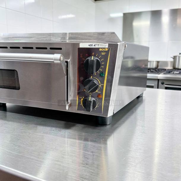 Superior condition Equipex PZ-4302D Sodir countertop pizza deck oven, 208–240V. Features intact controls, fully operational, stainless steel.