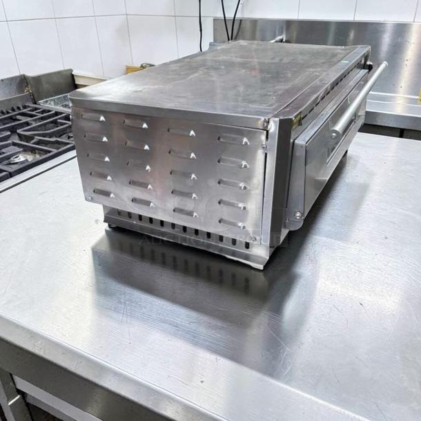 Alt text: Equipex PZ-4302D Sodir countertop pizza deck oven, stainless steel, superior condition, 208–240V, tested operational.