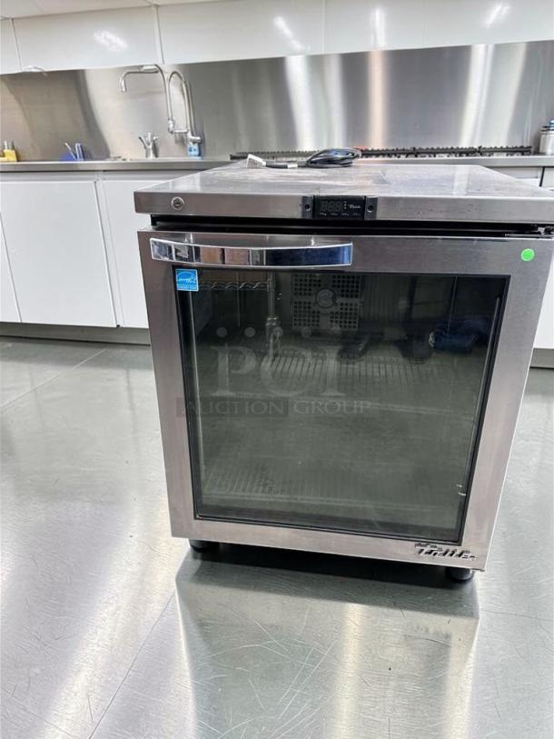 True TUC-27G-HC glass door refrigerator, stainless steel, 27-inch, 115V, superior condition, fully tested, operational.