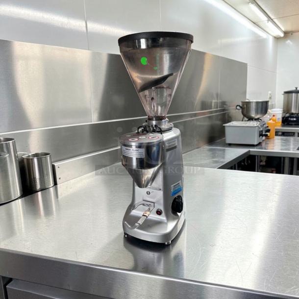 Mazzer Super Jolly V Up Electronic espresso grinder in exceptional condition on a stainless steel counter, fully tested, 120V.