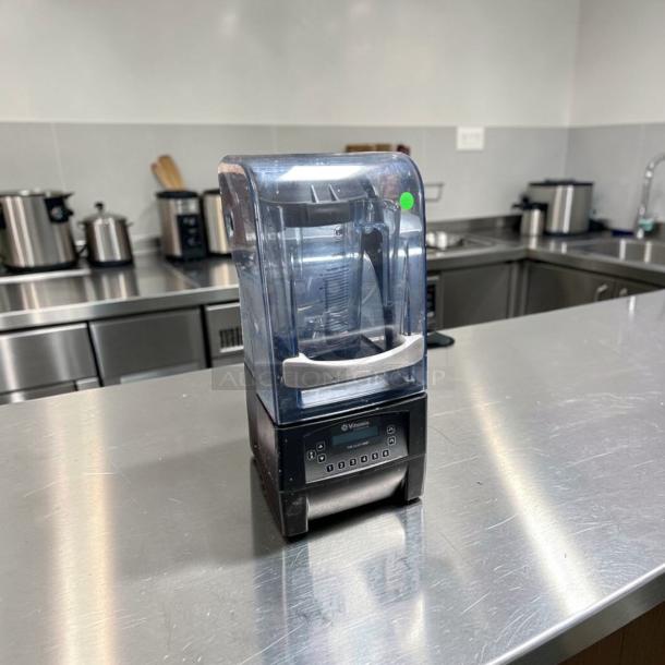 Vitamix The Quiet One blender, model VM0145, in top-tier condition with sound enclosure and 34 programs, on steel counter.