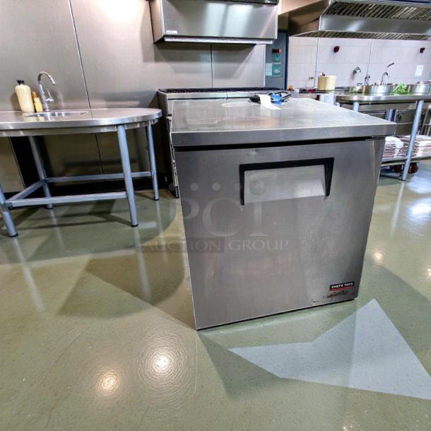 True TUC-27F-LP-HC undercounter freezer, 27", stainless steel, left hinge, commercial use, excellent condition, 115V.
