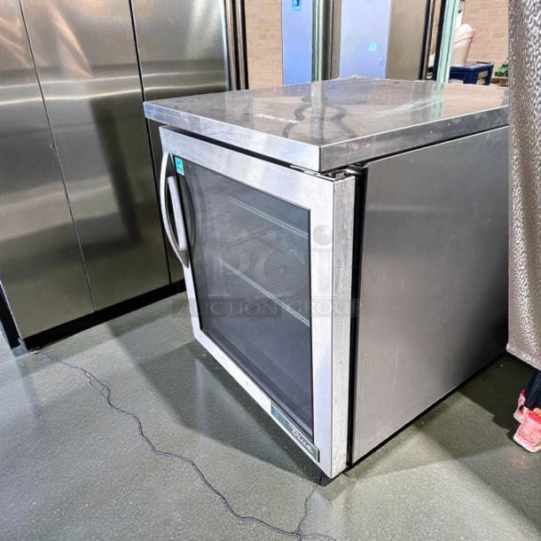 True TUC-27G-LP-HC~FGD01 low profile stainless steel undercounter refrigerator, glass door, excellent condition, 115V, commercially tested.