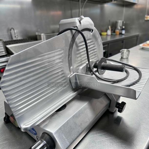 Globe C10 Chefmate meat slicer with 10" blade, belt driven, 1/4 HP, stainless steel, top-tier condition, fully tested.