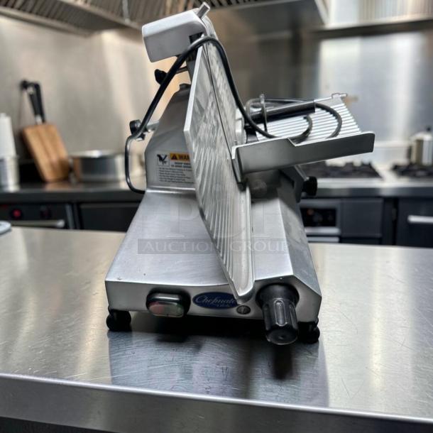 Globe C10 Chefmate meat slicer, 10" blade, stainless steel, belt-driven, 1/4 HP, excellent condition, fully tested.