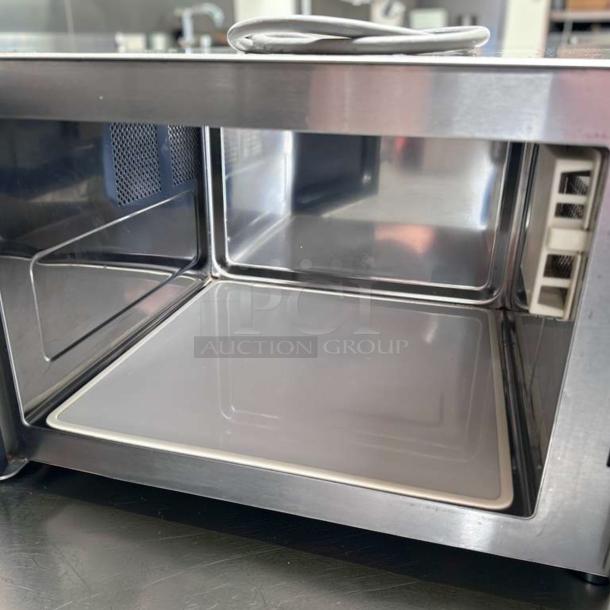 Amana RMS10DSA Commercial Microwave Oven, 1000W, stainless steel, dial controls, exceptional condition, interior view.