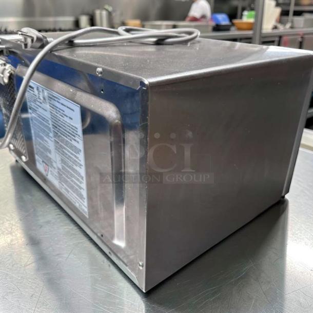 Amana RMS10DSA commercial microwave oven, 1000W, stainless steel, exceptional condition, visible operational label, 120V.