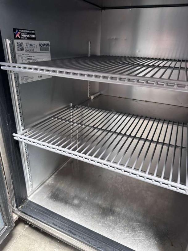 True TUC-72-HC ADA undercounter refrigerator, 3-door, stainless steel, excellent condition, model details visible.
