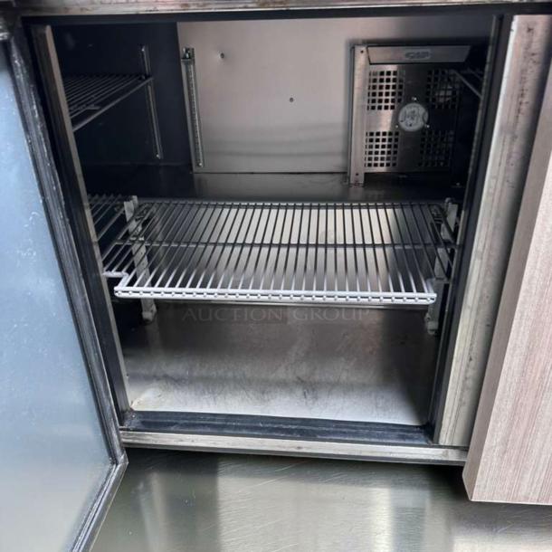 True TUC-72-HC ADA 72" undercounter refrigerator, stainless steel, 3-door, fully tested, exceptional condition, interior view.