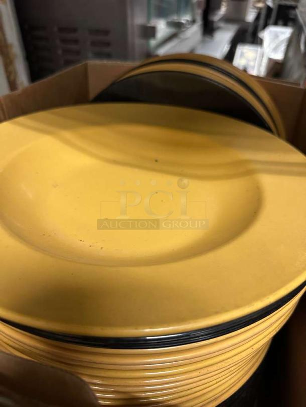Lot of approx. 30 yellow and black melamine plates in excellent condition, heavy-duty restaurant quality. (MEL-S-PLT-0828)