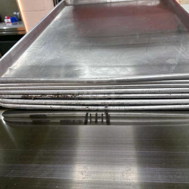 Seven Winco ALXP-1826 full-size sheet pans, 26x18 inches, 18-gauge aluminum, heavy-duty, outstanding condition.