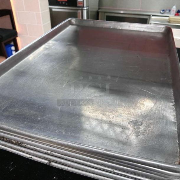 Seven Winco ALXP-1826 full-size sheet pans, 26"x18", 18 gauge aluminum, heavy-duty, outstanding condition, commercial baking use.