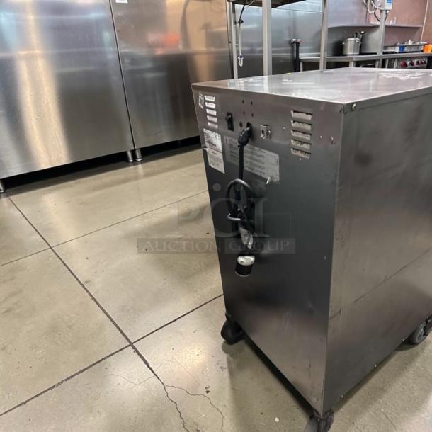 Alto-Shaam 1000-TH/II Halo Heat Cook & Hold Oven, half-size, commercial, 208-240V, excellent condition, on wheels.