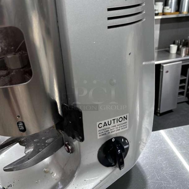Mazzer Major V Automatic Espresso Grinder, prime condition, 110V, commercial use, caution label visible, made in Italy.