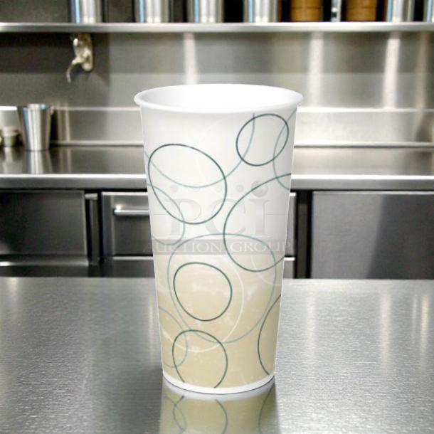 Exceptional condition Graphic Packaging DMT-24 24 oz tall paper cold cup, champagne design, new, bulk case.