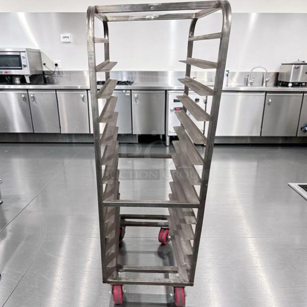 Heavy-duty stainless steel bun pan rack, mobile, superior condition, tested, 10-tier, red casters, for bakery/kitchen use.