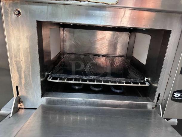 Amana AXP20 high-speed microwave convection oven, 1.38 cu. ft., commercial grade, excellent condition, fully operational.