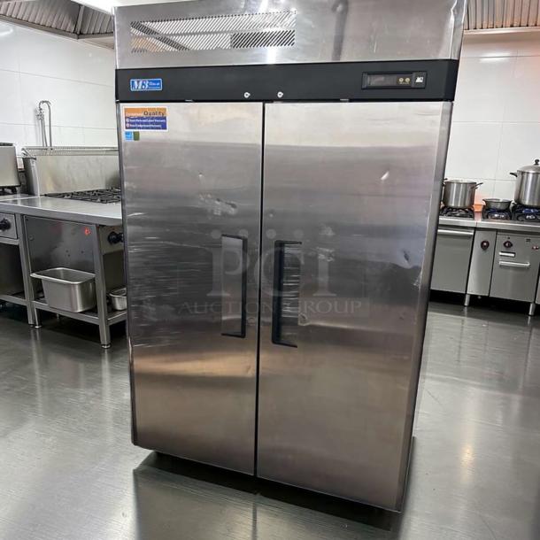 Turbo Air M3R47-2 reach-in refrigerator, dual solid doors, stainless steel, commercial grade, fully tested, excellent condition.