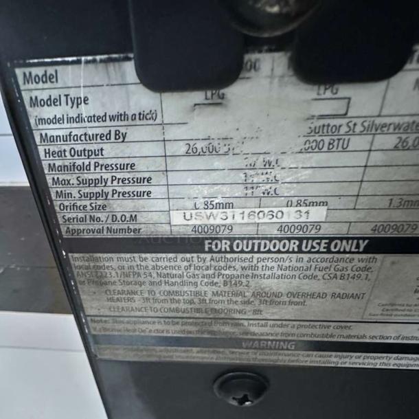 Label on Bromic Tungsten Smart-Heat Gas Radiant Heater. Details: Model uses LPG, Heat Output 26,000 BTU, Serial No. USW311606031.