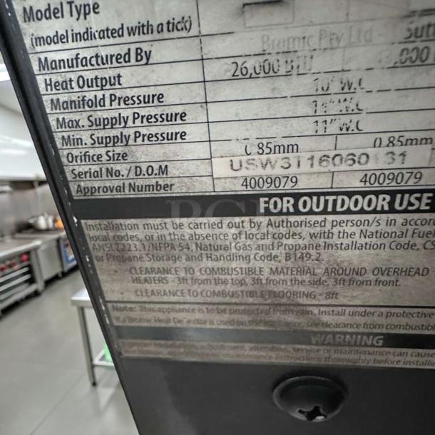 Label on Bromic Tungsten Smart-Heat Gas Heater. Shows heat output, pressures, orifice size, serial no. For outdoor use.