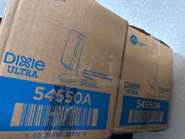 Dixie Ultra 54550A napkin dispenser boxes with barcode, branded for commercial use.