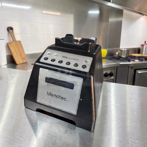 Blendtec EZ600 commercial blender base, model ES3, in elite condition with visible control panel, on a kitchen countertop.