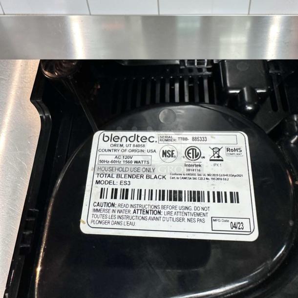 Label showing Blendtec EZ600 Blender details, with 1500W motor, model ES3, and serial number TTBB-885333. Made in USA.