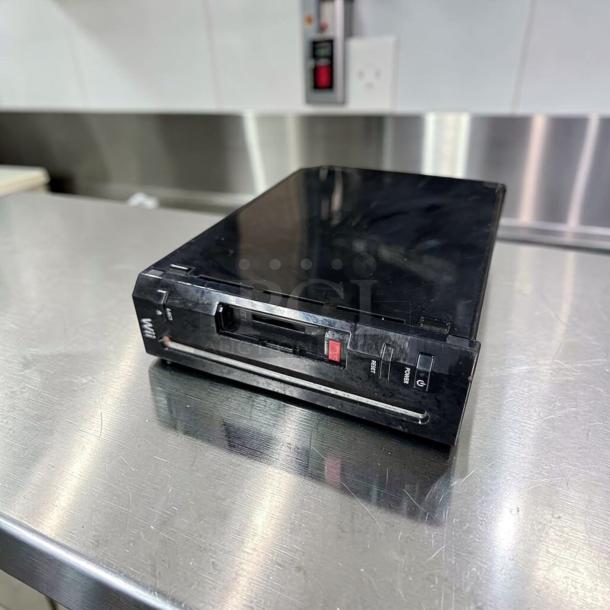 Black Nintendo Wii RVL-001 console, excellent condition, region-free, GameCube compatible, fully tested, model NIN-S-WII-0850.