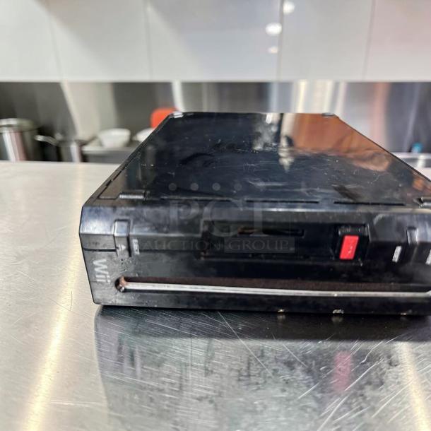 Nintendo Wii RVL-001 black console, excellent condition, region free, GameCube compatible, fully tested, serial NIN-S-WII-0850.