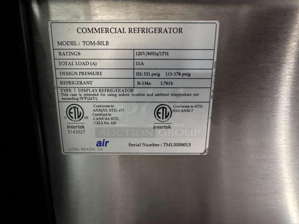 Turbo Air TOM-50LB-N label showing model, ratings 120V/60Hz, 11A, R-134a refrigerant, certification details, and serial number TML50B8013.