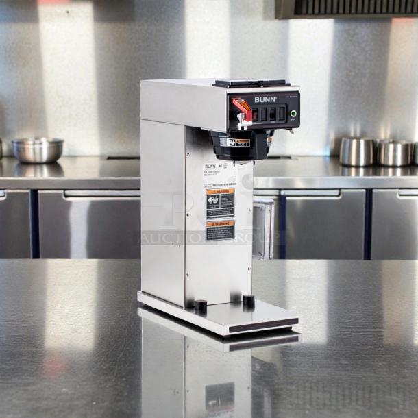 Bunn CWTF15-APS automatic airpot coffee brewer in outstanding condition, 120V, with hot water faucet, fully tested operational.