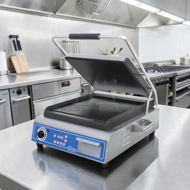 Globe GSG14D Deluxe Panini Grill with 14"x14" smooth plates; excellent condition, fully operational; 120V commercial use.
