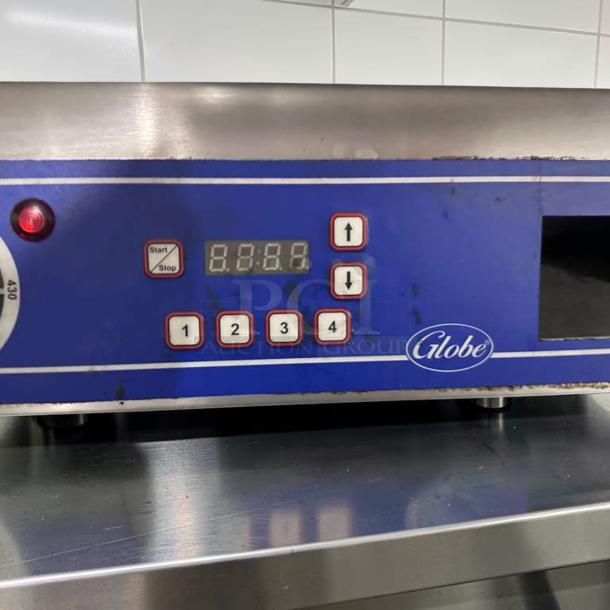 Globe GSG14D Deluxe Panini Grill with control panel and buttons, commercial-grade, superior condition, fully operational.