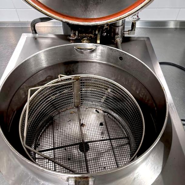 BKI FKG-FC commercial gas pressure fryer, 24" wide, 18 lb capacity, stainless steel, prime condition, fully tested.