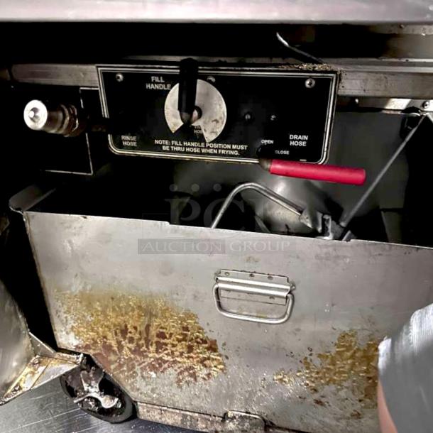 BKI FKG-FC Commercial Gas Pressure Fryer, 24" wide, 18 lb capacity, 70,000 BTU, stainless steel, control panel showing fill handle.