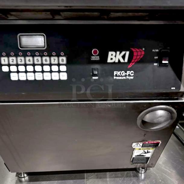 BKI FKG-FC Gas Pressure Fryer, 24" wide, 18 lb capacity, 70,000 BTU, stainless steel, tested and operational, control panel visible.