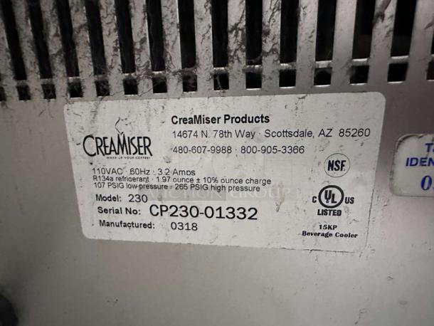 CreaMiser Model 230 commercial cold brew dispenser label, dual tap, Scottsdale, AZ. Features specs, serial CP230-01332.