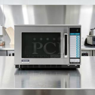 Sharp R22GTF Commercial Microwave, 1,200W, stainless steel, 20 programmable buttons, superior condition, tested operational.