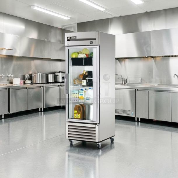 True T-23G-HC reach-in refrigerator, 27" glass door, stainless steel, exceptional condition, 115V, fully tested, commercial use.