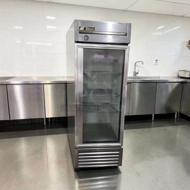 True T-23G-HC reach-in refrigerator, 27" glass door, commercial stainless steel, exceptional condition, fully tested.