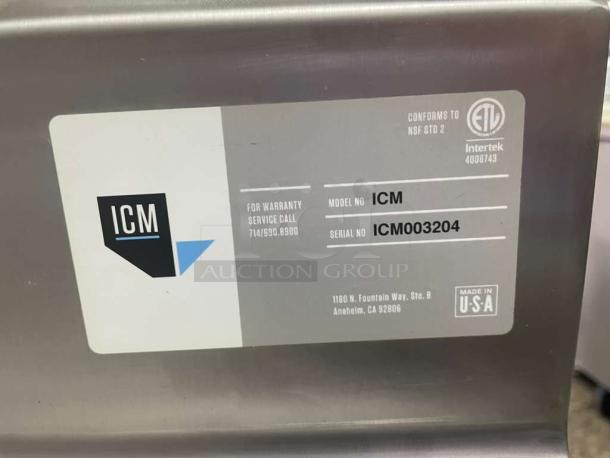 ICM stainless steel prep sink table label showing model ICM, serial number ICM003204, and contact details. Made in USA.