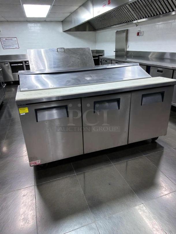 True TSSU-72-18 refrigerated prep table, 72", 3-door, stainless steel, high-grade condition, fully operational, NSF & UL listed.