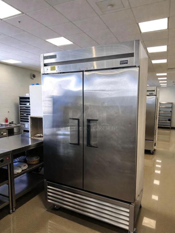 Commercial Grade Two-Door Reach-In Refrigerator, stainless steel, bottom-mount, immaculate condition, fully tested.