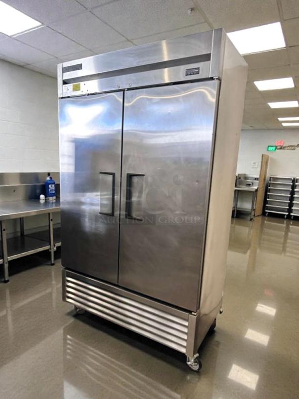 Commercial stainless steel two-door reach-in refrigerator, immaculate condition, bottom-mount, model REF-L-2DR-0472.
