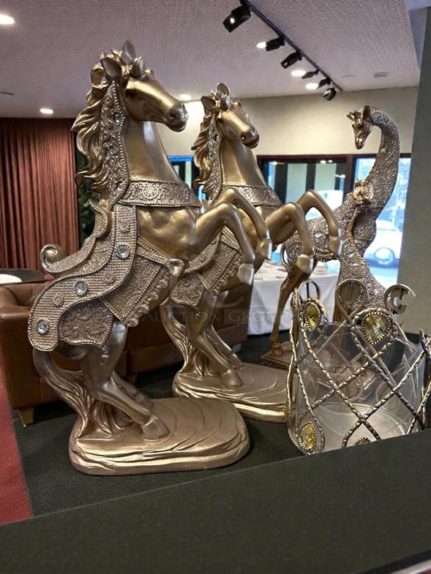 Decorative Accent Collection gold horse and peacock statue set in like-new condition, detailed with ornate embellishments.