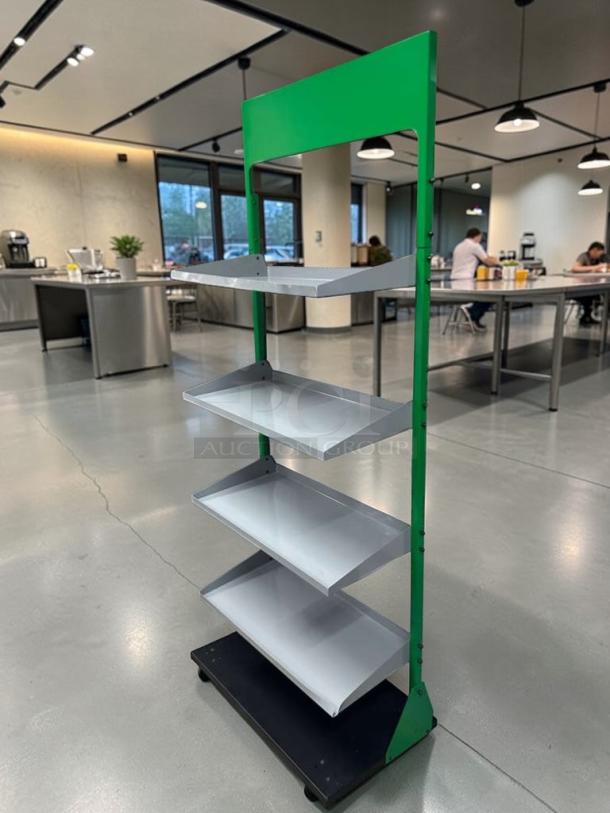 Commercial grade 4-tier gondola display shelf, heavy-duty, prime condition, green and gray, ready for use (Model RET-S-SHLF-0584).