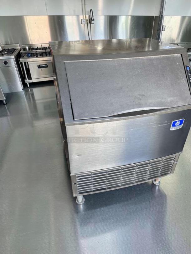 Manitowoc UY0310A-161B ice maker, prime condition, stainless steel, air-cooled, undercounter design, fully tested.