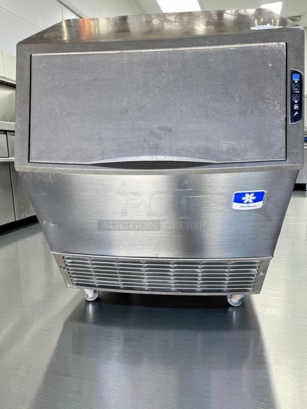 Manitowoc UY0310A-161B commercial ice maker, air-cooled, stainless steel, fully operational, prime condition, 115V.