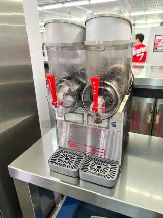 Ugolini NHT2 double bowl slush machine, NSF & UL listed, superior condition, stainless steel, fully tested operational unit.