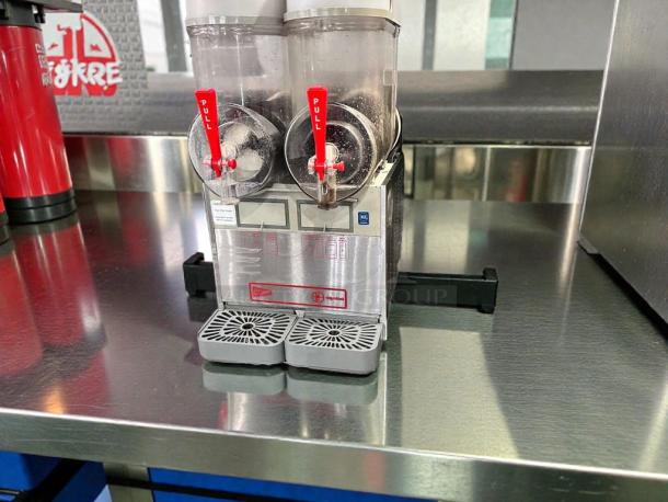 Ugolini NHT2 double bowl slush machine, superior condition, NSF & UL listed, fully tested, visible controls and levers.